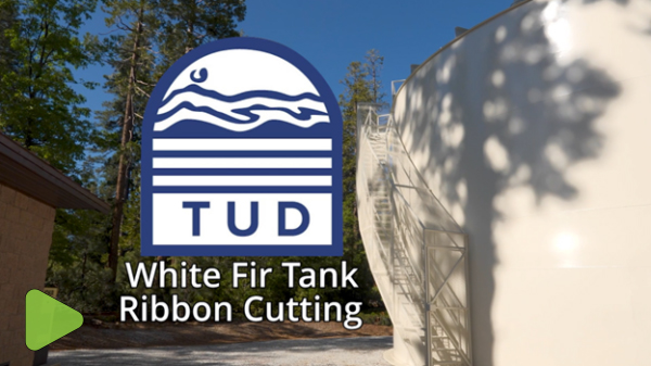 Public Works Video Production | TUD White Fir Tank Ribbon Cutting Tuolumne Utilities District video featuring a large white water storage tank, the TUD logo, and text reading "White Fir Tank Ribbon Cutting" with a green play button.